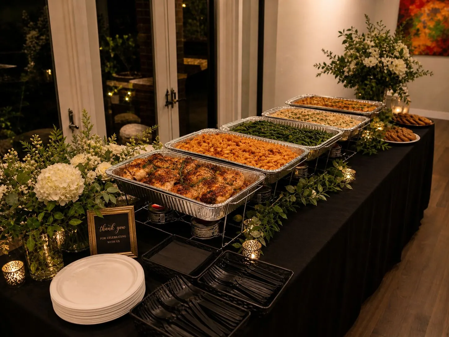 Drop-off dinner trays with hot entrees and sides delivered to a San Francisco apartment gathering by Winslow's Catering