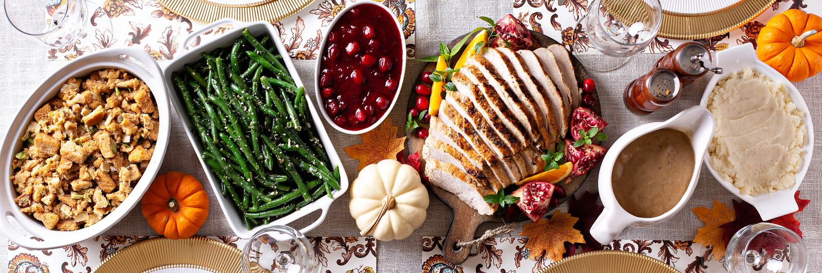 Herb-roasted holiday turkey with rosemary and cranberries ready for carving at a Winslow's holiday catering dinner in San Francisco